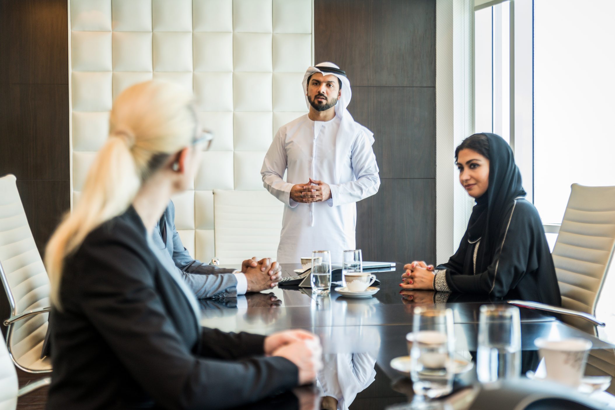 T2G - Multicultural business people meeting and talking about business - Multiracial business team meeting